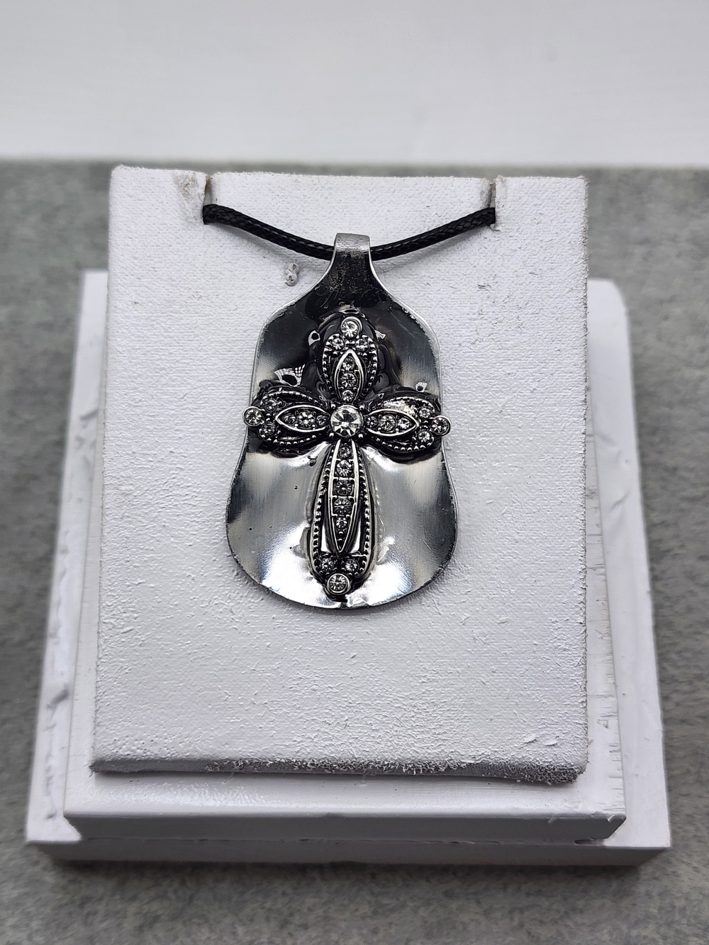 Ornate Silver Cross Pendant on Black Cord